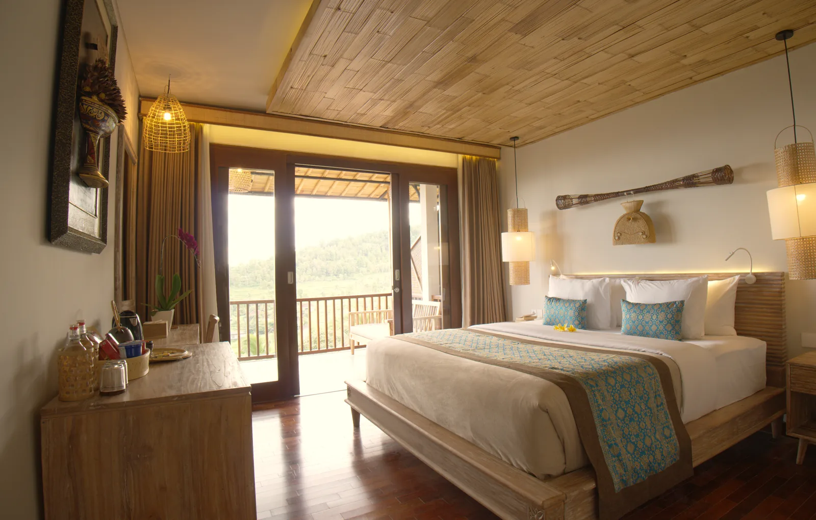 Bedroom with a balcony view of the hills